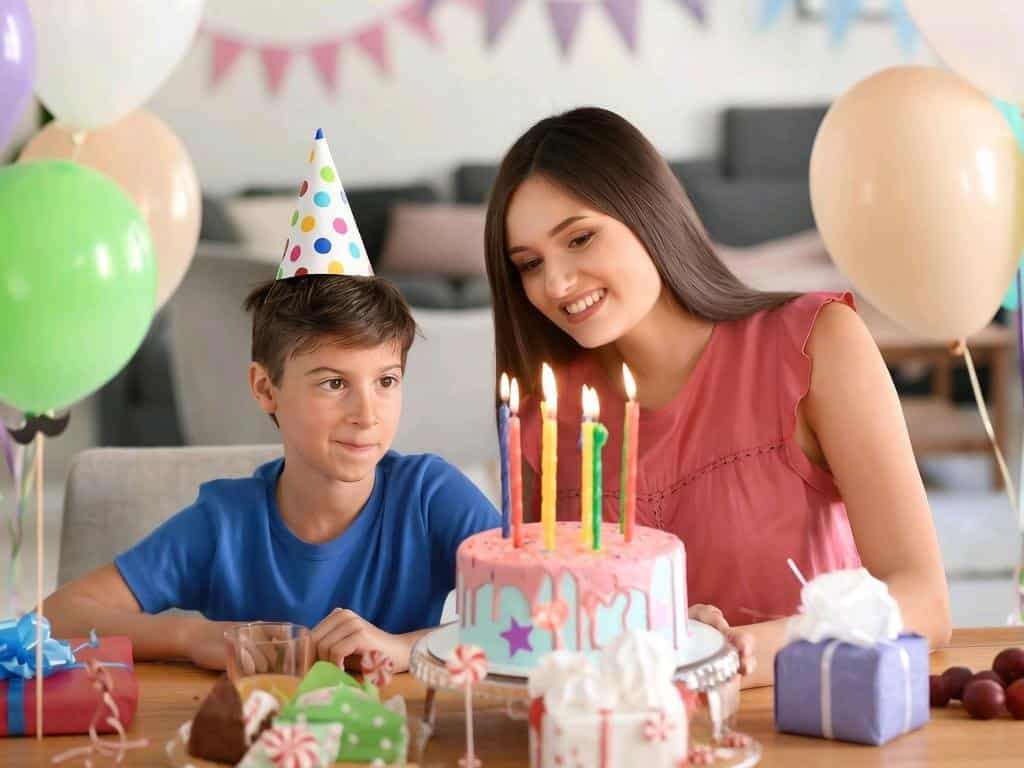 Visual Hook: A warm, joyful birthday celebration captured with two people smiling aroun...