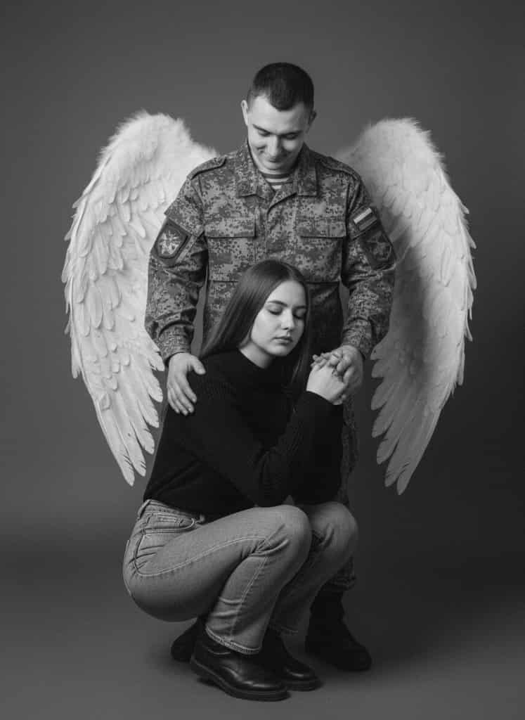 Visual Hook: A poignant black and white portrait of two figures, one kneeling in contem...